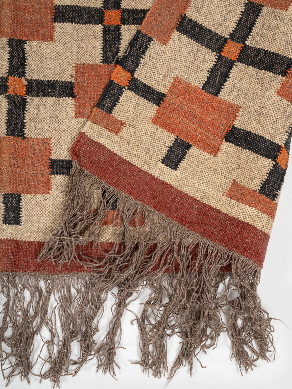 The Blush Ladder detail of the striped wool surface and edge finishing