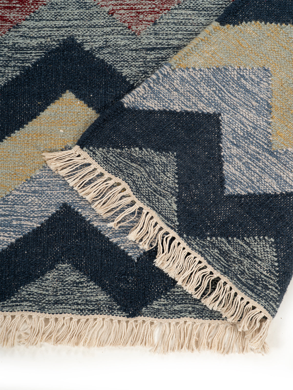 The Coastal Chevron Rug detail of the geometric pattern in wool