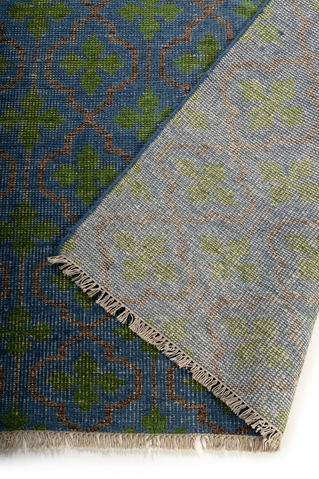 The Cotswold Meadow detail of the floral motif in handspun wool cut pile