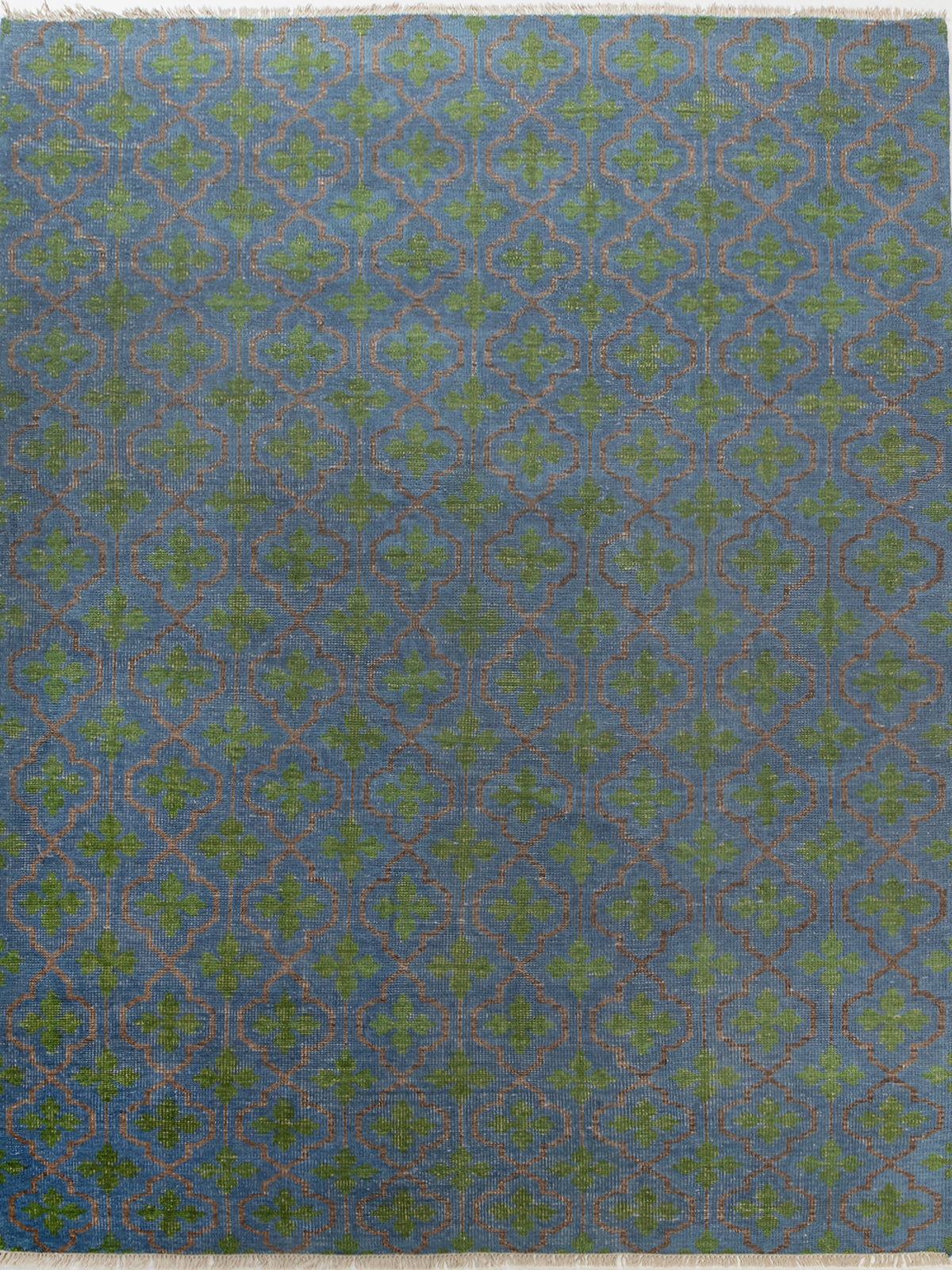 The Cotswold Meadow handspun wool rug in multicoloured tones