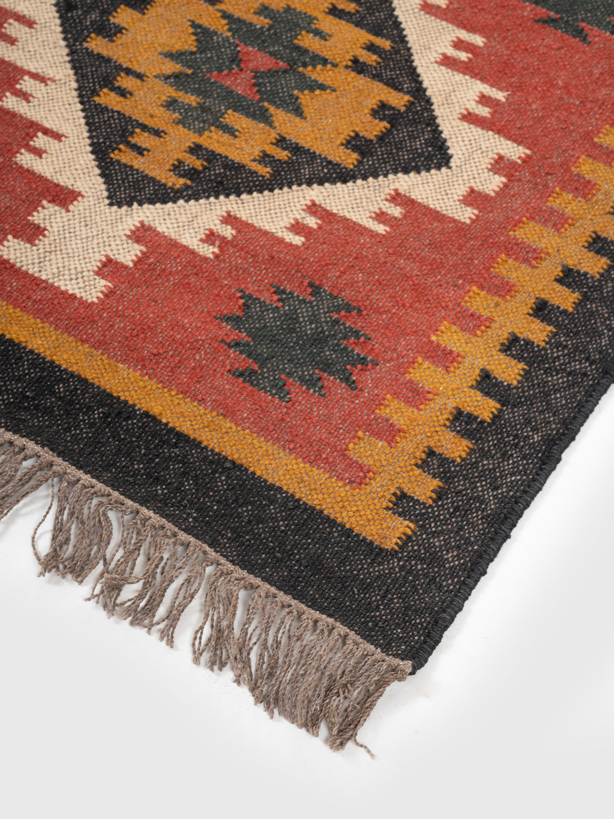 The Crimson Dash Runner close-up showing the wool weave and stripes surface