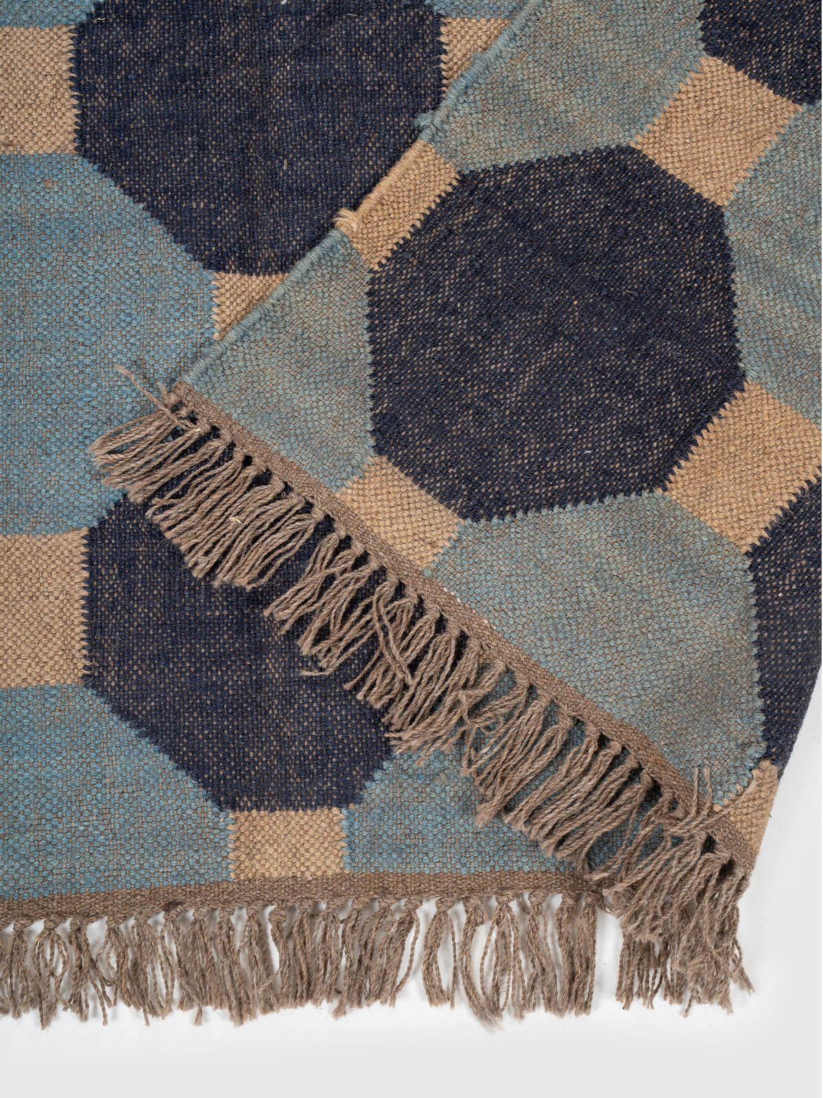 The Denim Grid Kilim detail of the geometric pattern in wool