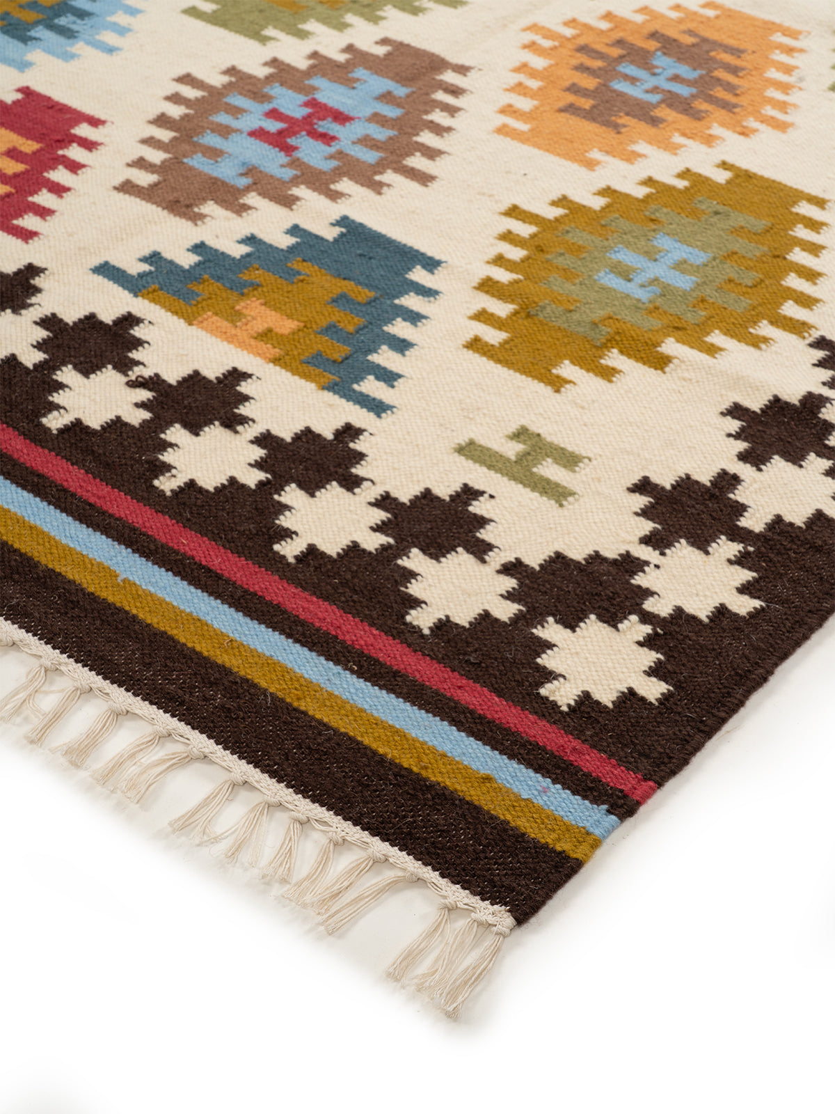 The Desert Oasis Rug close-up showing the wool weave and traditional motif