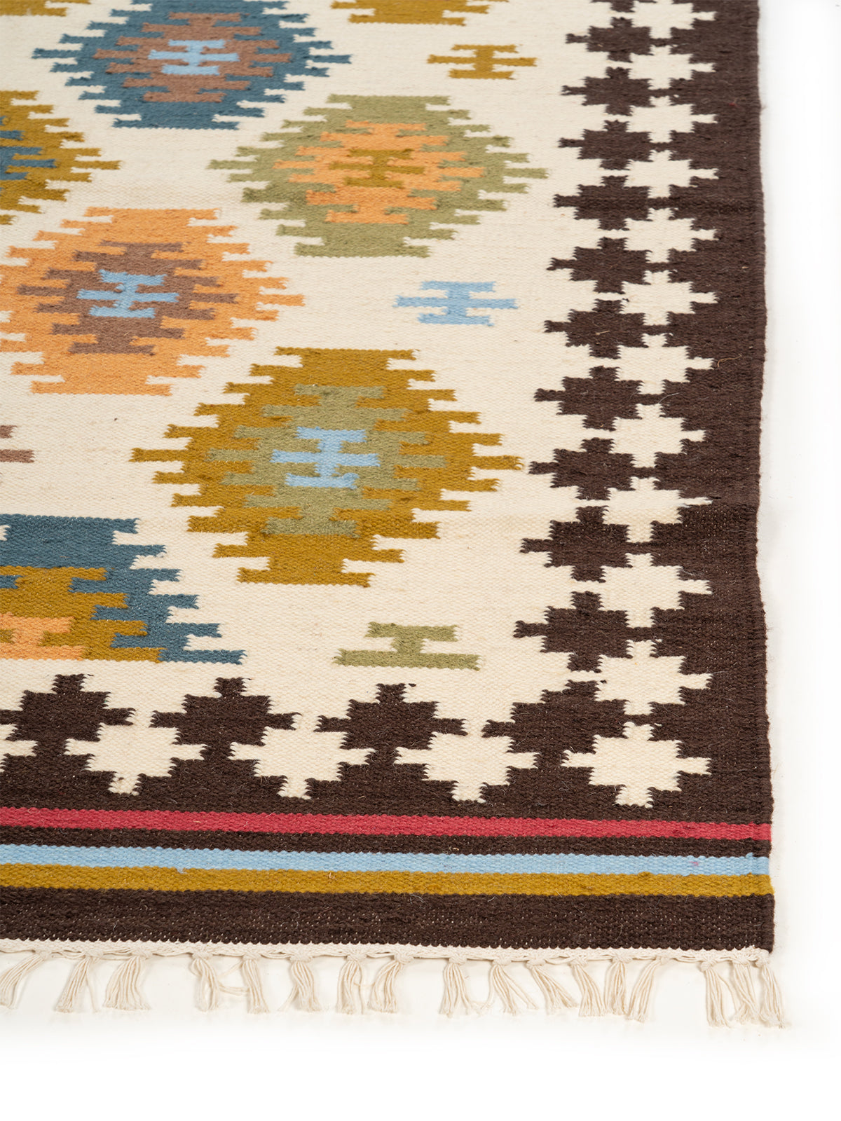 The Desert Oasis Rug wool rug styled in a living room interior