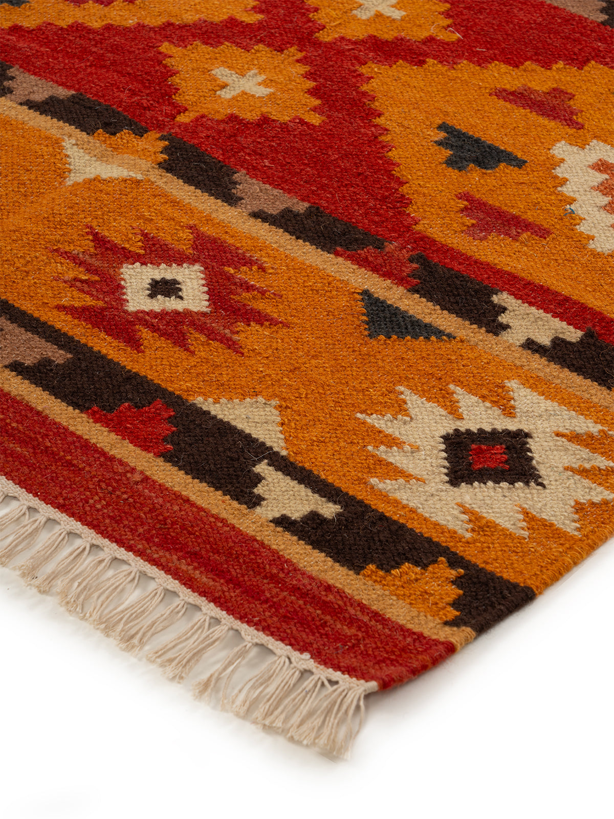 The Desert Sun Rug close-up showing the wool weave and geometric motif