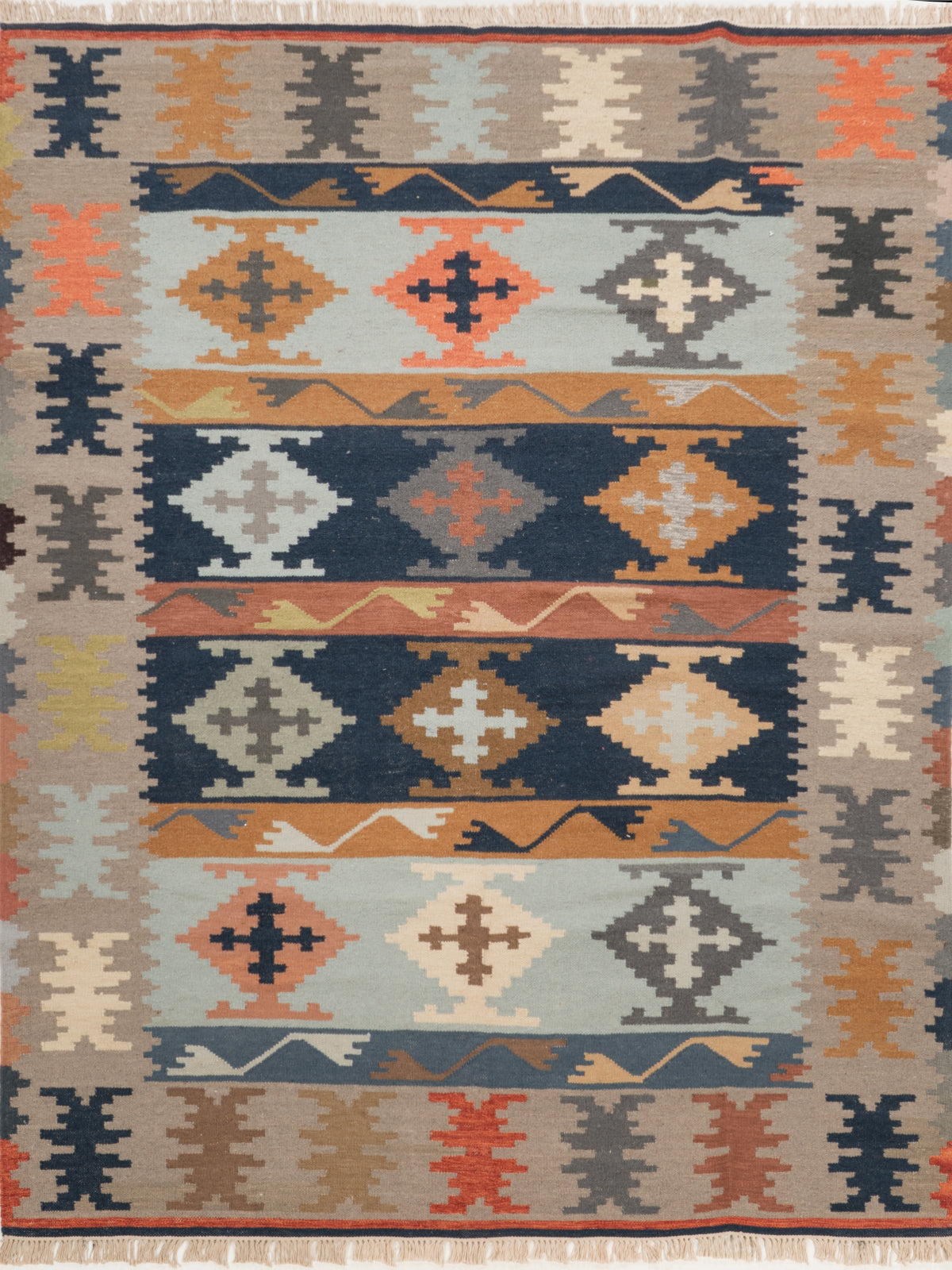 The Earth & Sea Rug wool rug in blue tones