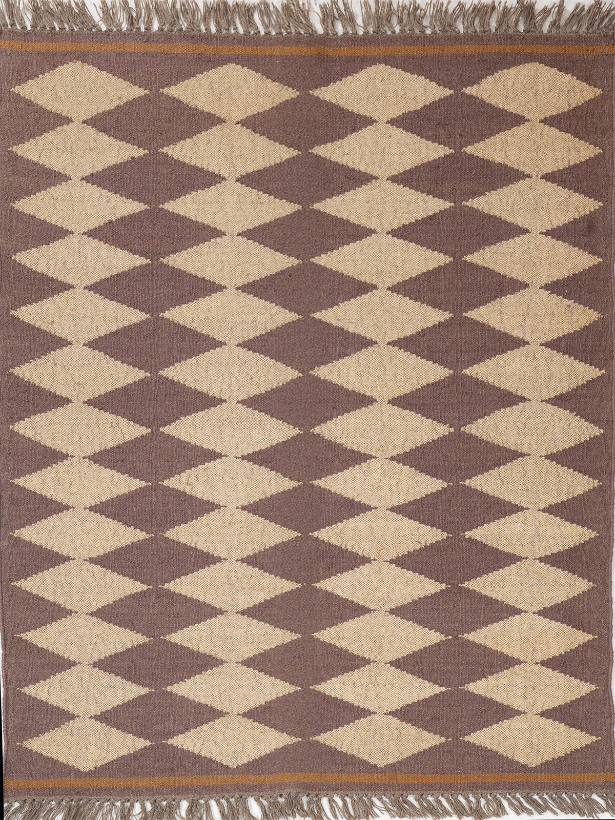 The Ember Star Rug wool rug in red tones