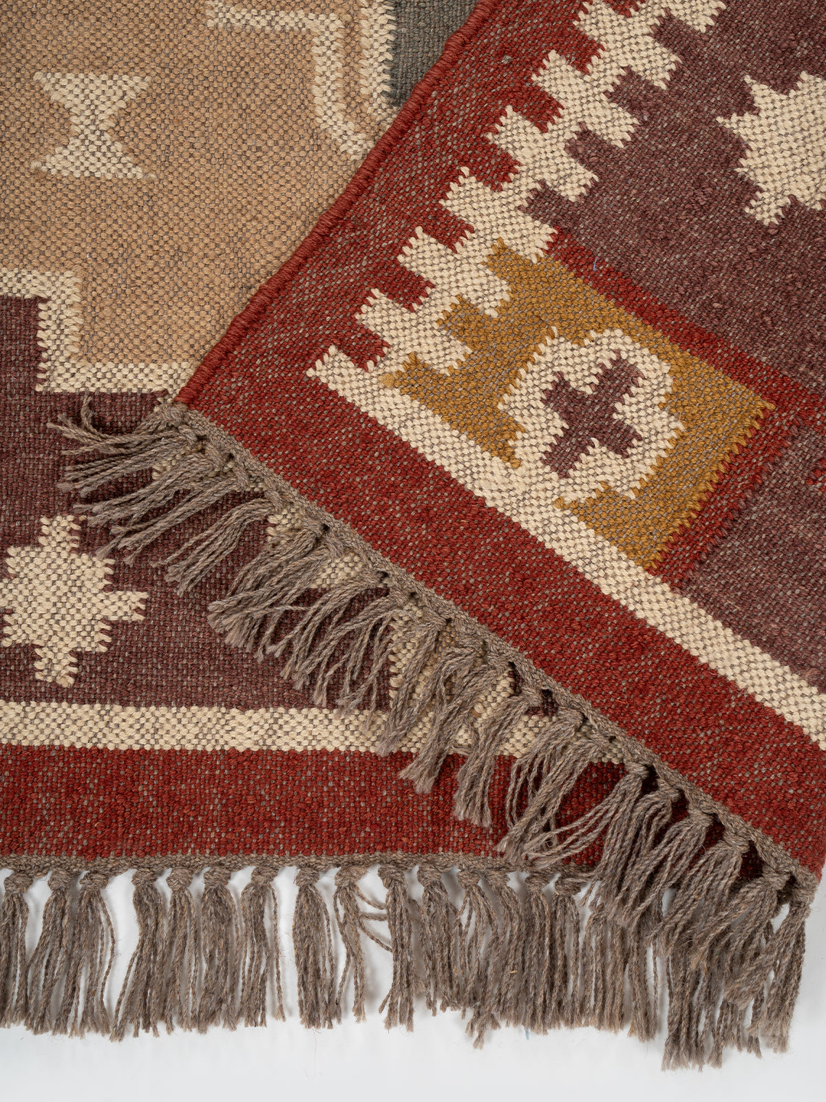 The Fortress Shield Kilim detail of the geometric pattern in wool
