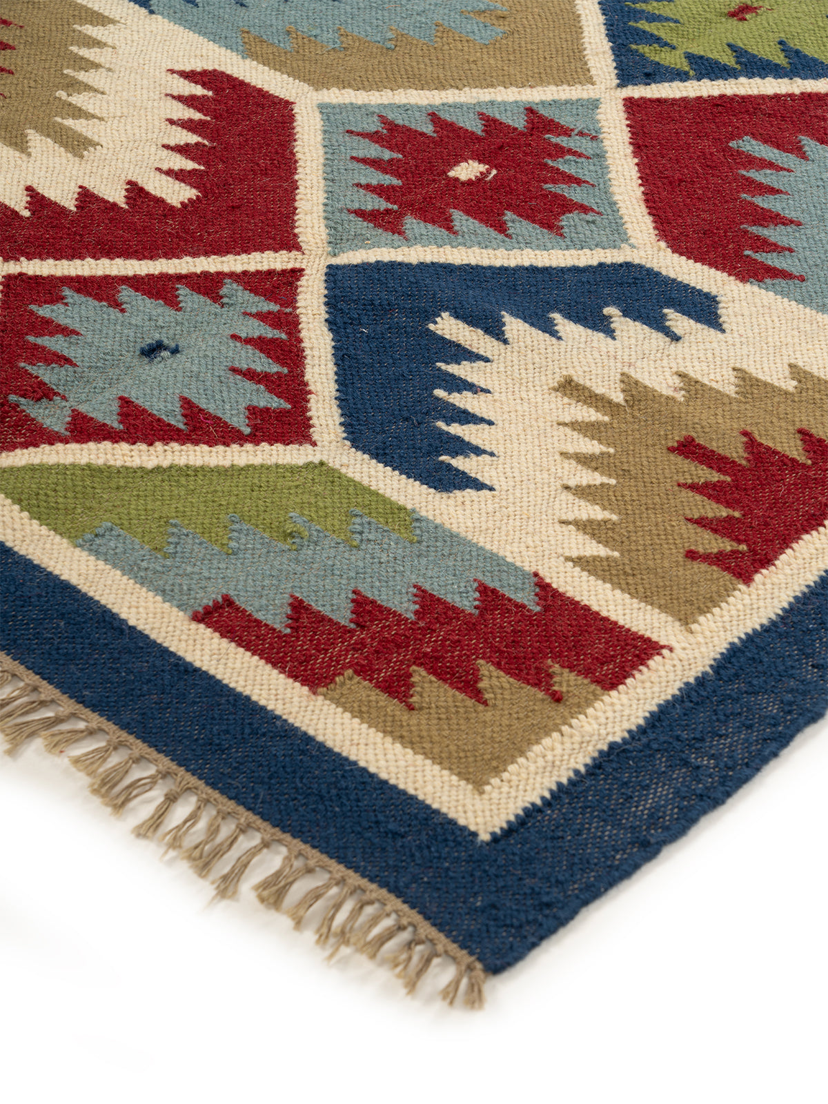 The Geometric Fields Rug close-up showing the wool weave and geometric motif