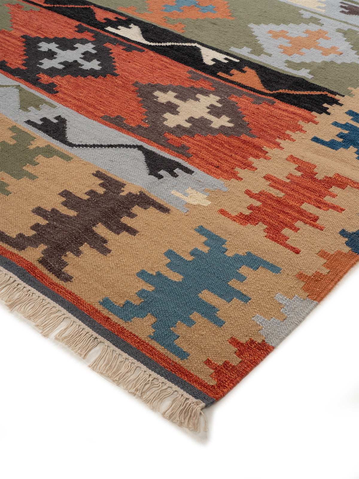 The Harvest Patchwork Rug close-up showing the wool weave and geometric motif