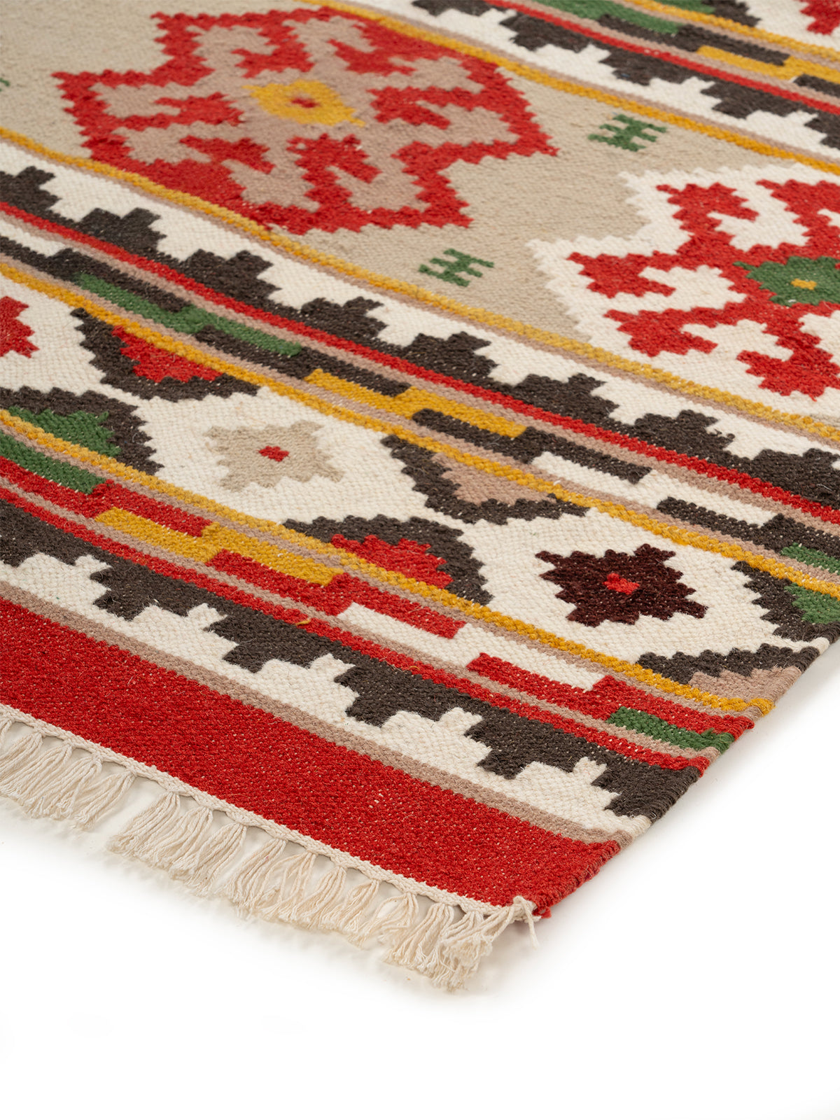 The Heritage Kilim close-up showing the wool weave and traditional motif