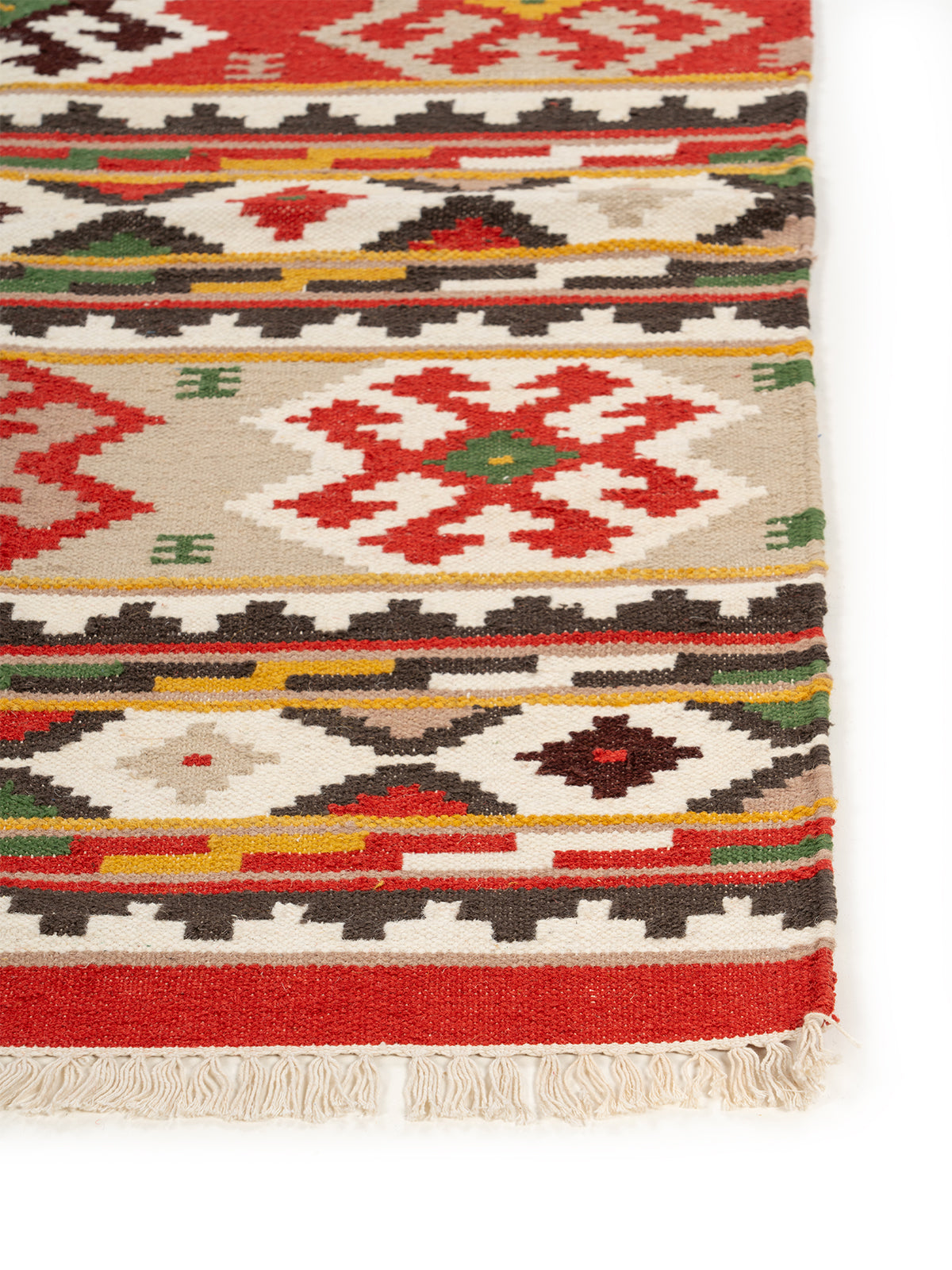 The Heritage Kilim wool rug styled in a living room interior