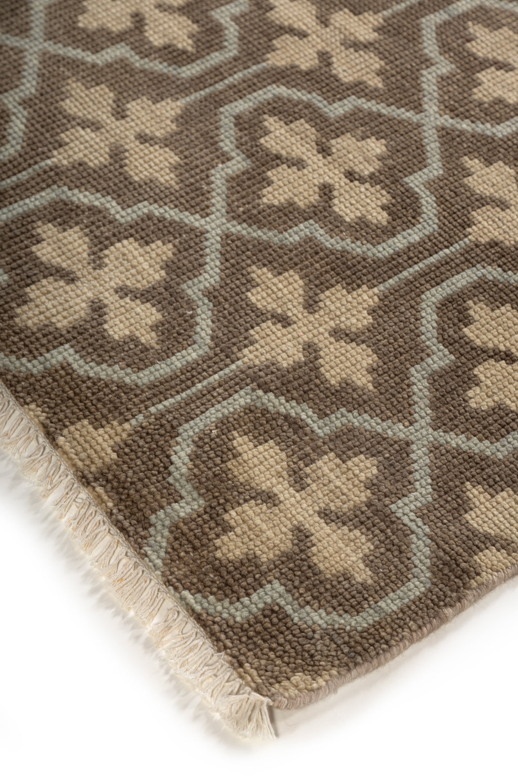 The Kensington Trellis close-up showing the handspun wool weave and geometric motif