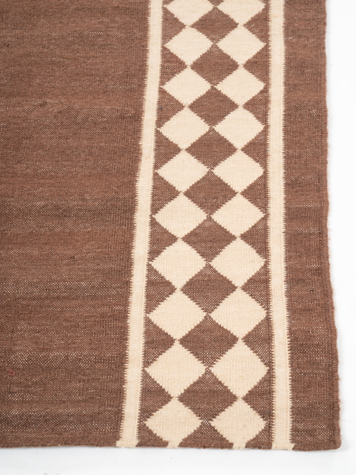 The Lattice Lane Runner - cotton runner laid in a hallway view