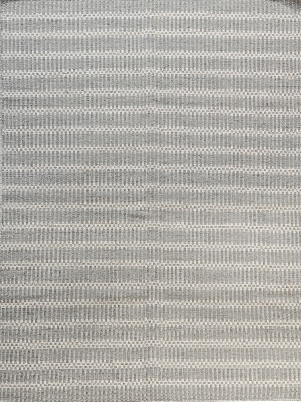 The Linear Calm wool rug in neutral tones