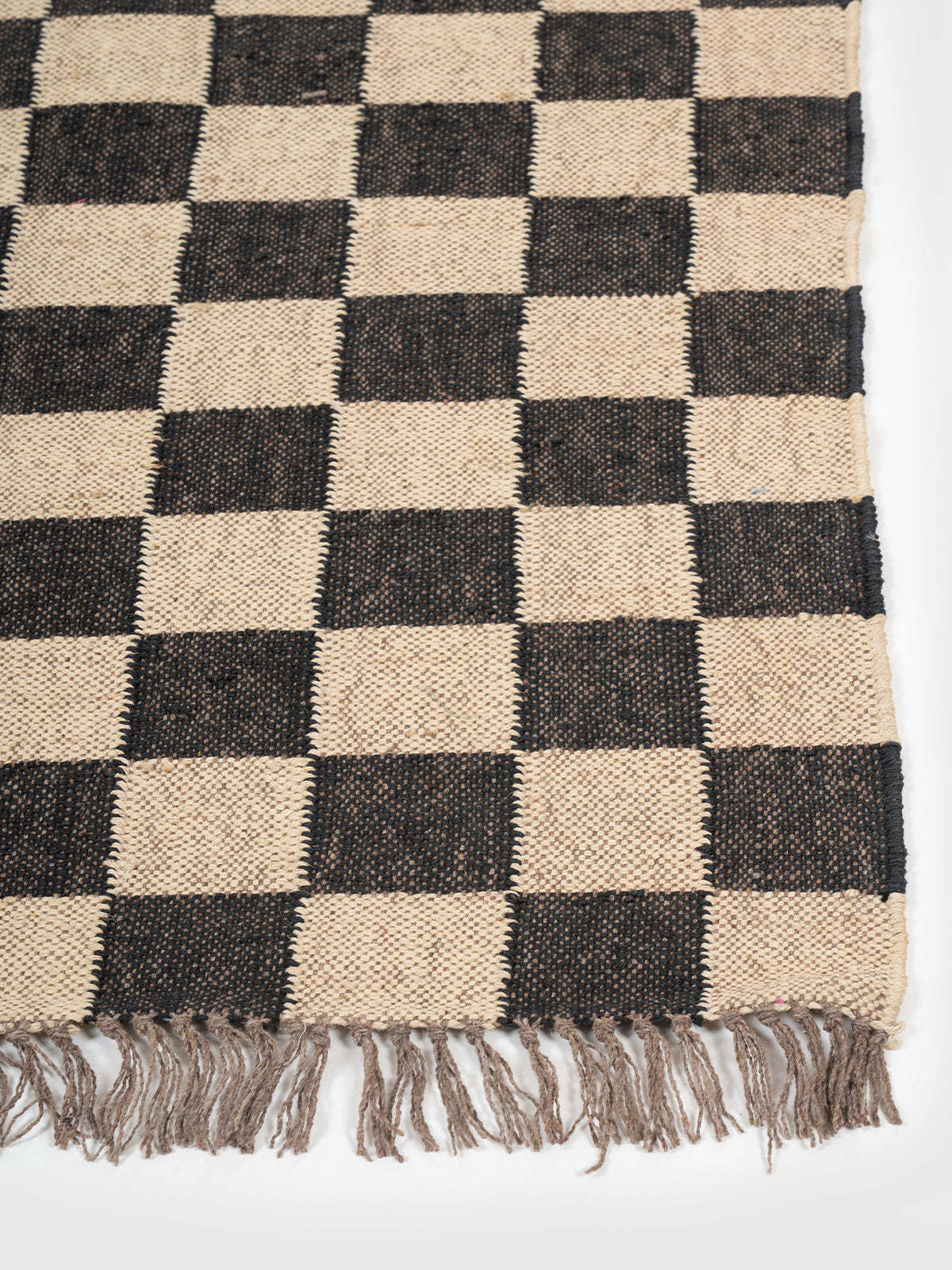 The Neutral Block Runner wool stair runner styled on a staircase in a designed interior