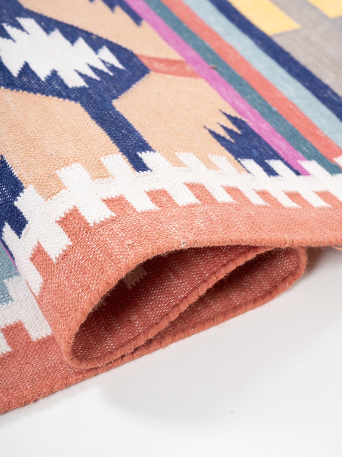 The Nomad's Weave Runner - cotton runner laid in a hallway view