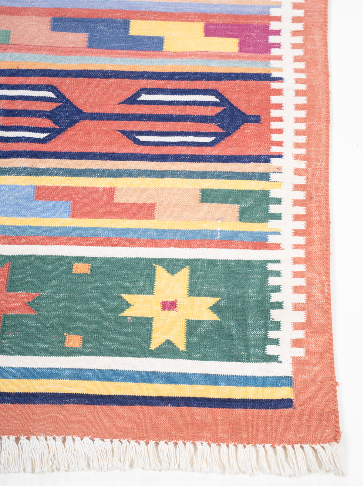 The Nomad's Weave Runner cotton stair runner styled on a staircase in a designed interior