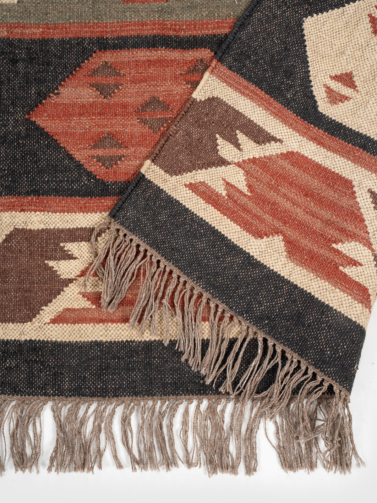 The Olive Talisman Rug detail of the traditional motif in wool
