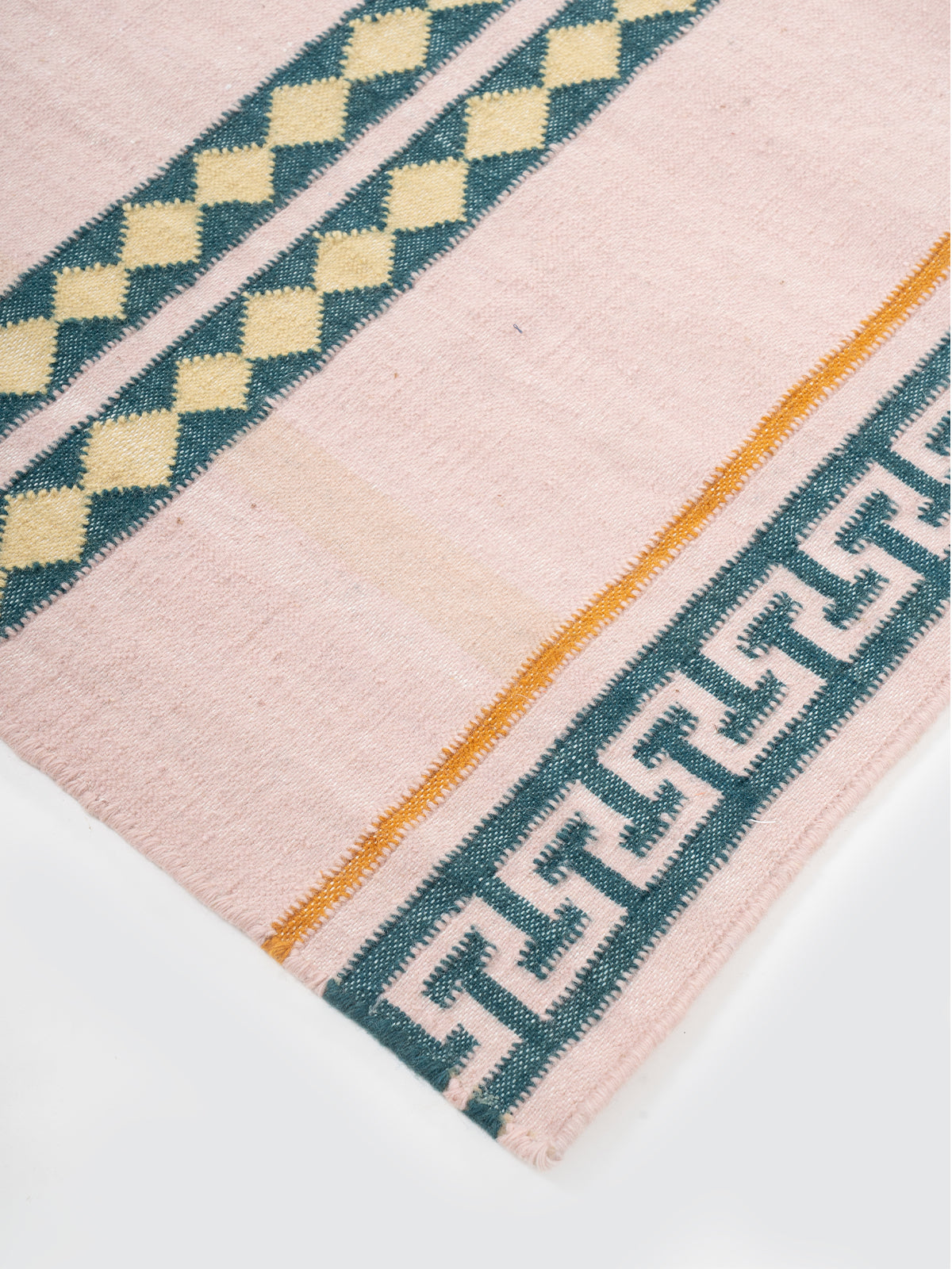 The Palace Key Runner-Pink close-up showing the cotton weave and traditional surface