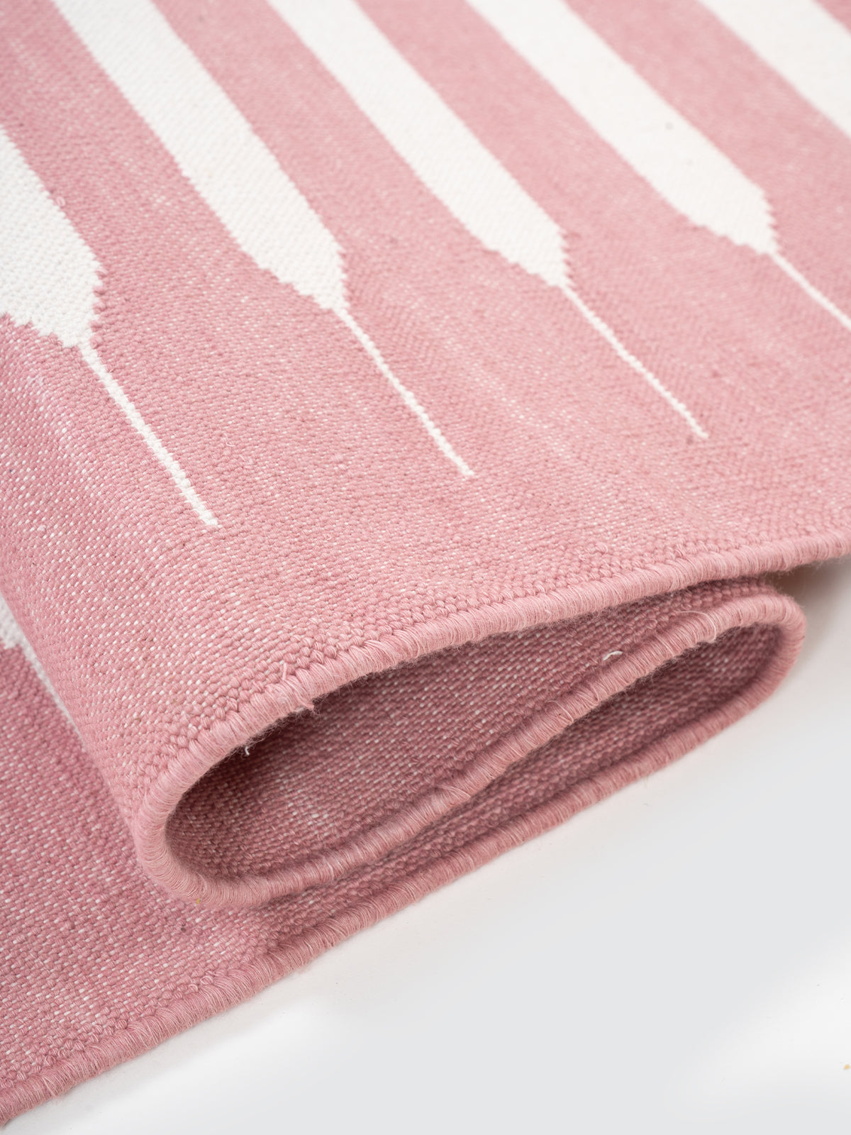 The Petal Path Runner - cotton runner laid in a hallway view