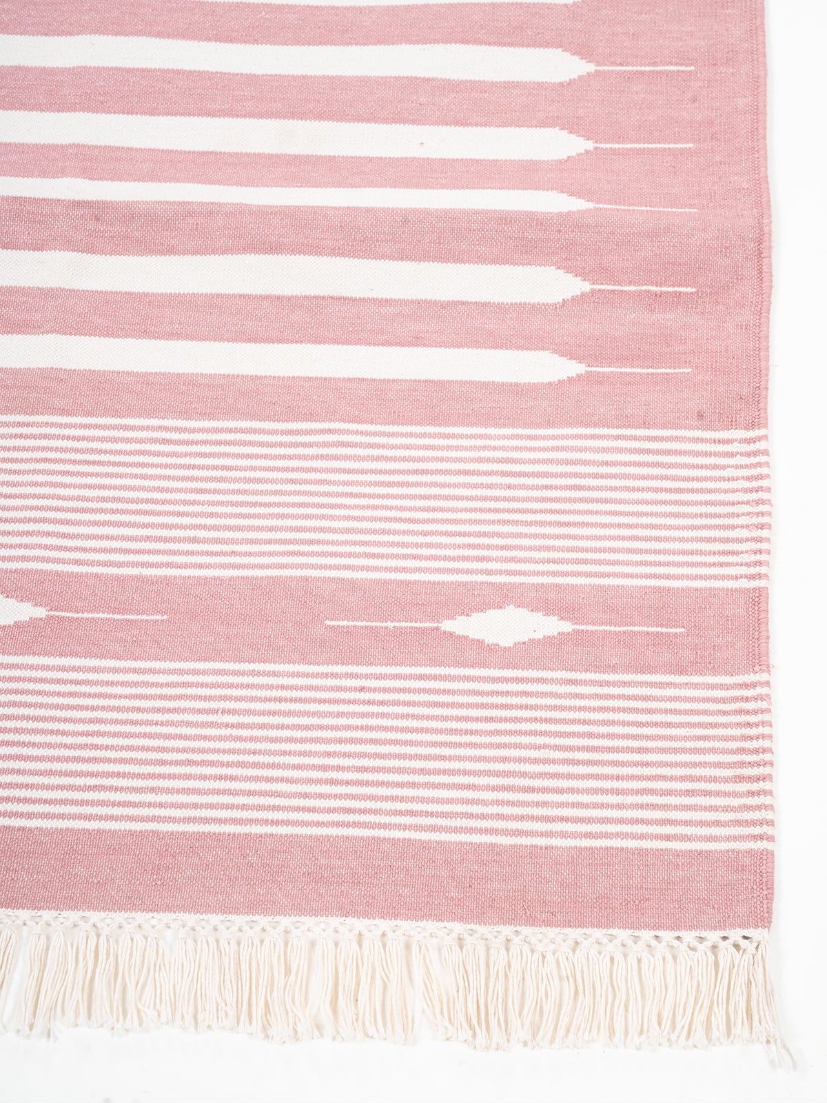 The Petal Path Runner cotton stair runner styled on a staircase in a designed interior
