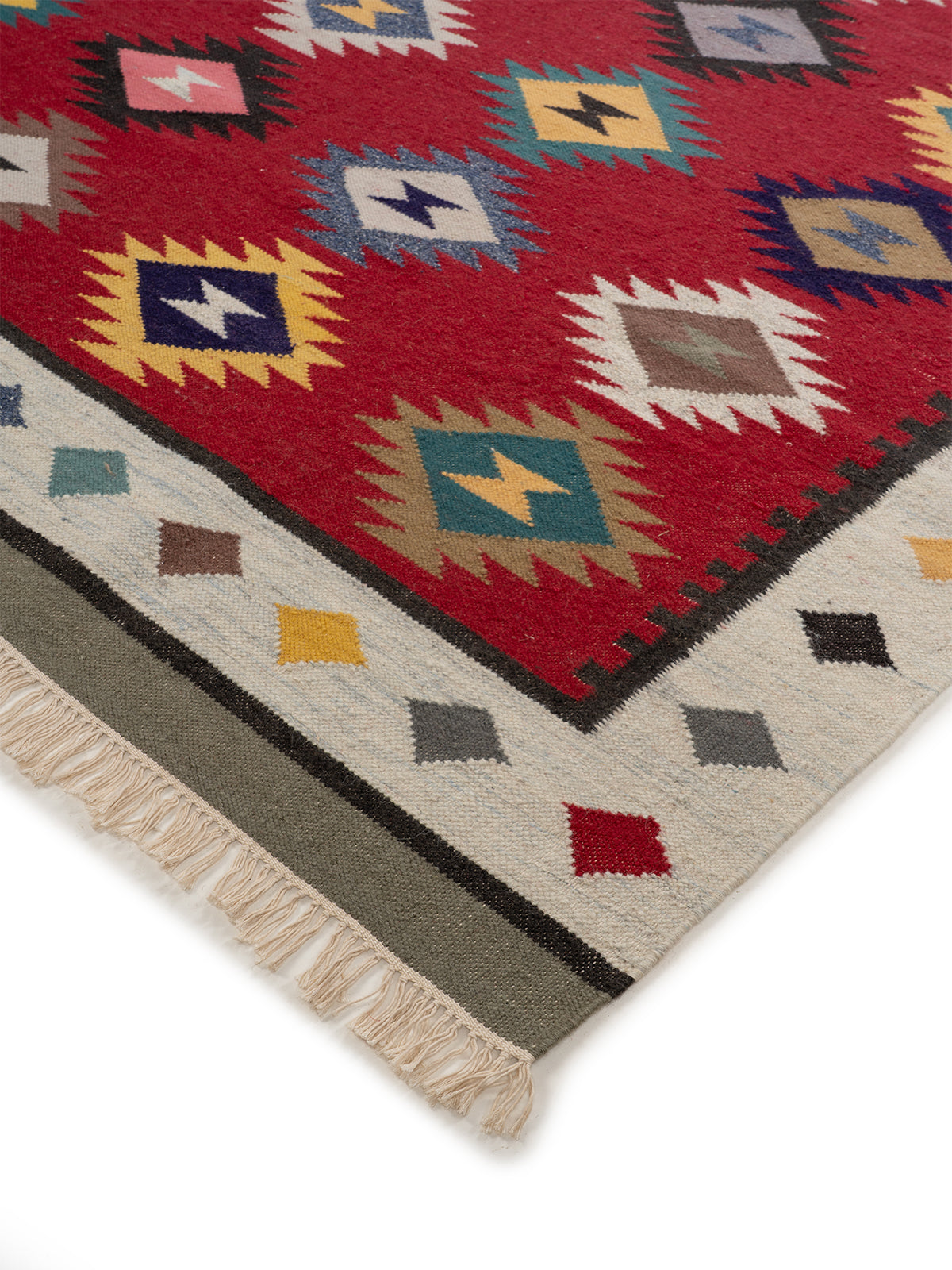The Ruby Diamond Rug close-up showing the wool weave and geometric motif