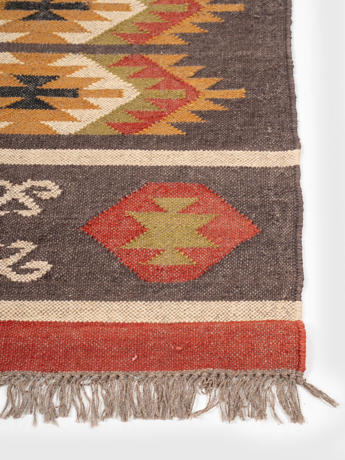 The Rustic Journey Runner wool stair runner styled on a staircase in a designed interior