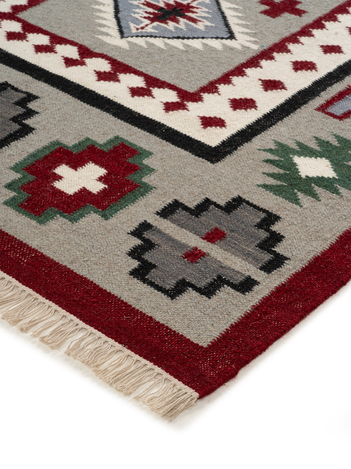 The Rustic Medallion Rug close-up showing the wool weave and traditional motif