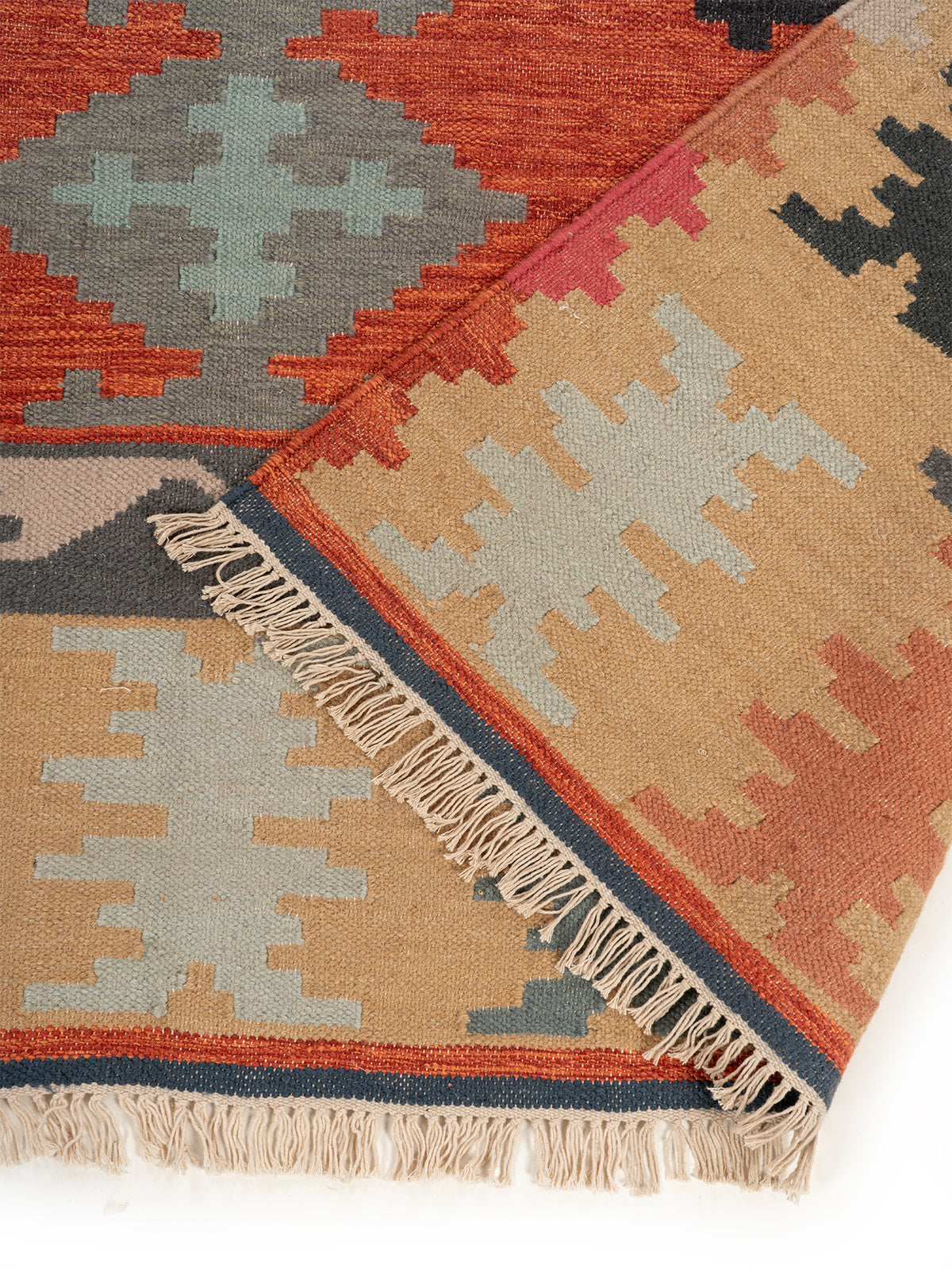 The Rustic Patchwork Rug detail of the geometric pattern in wool