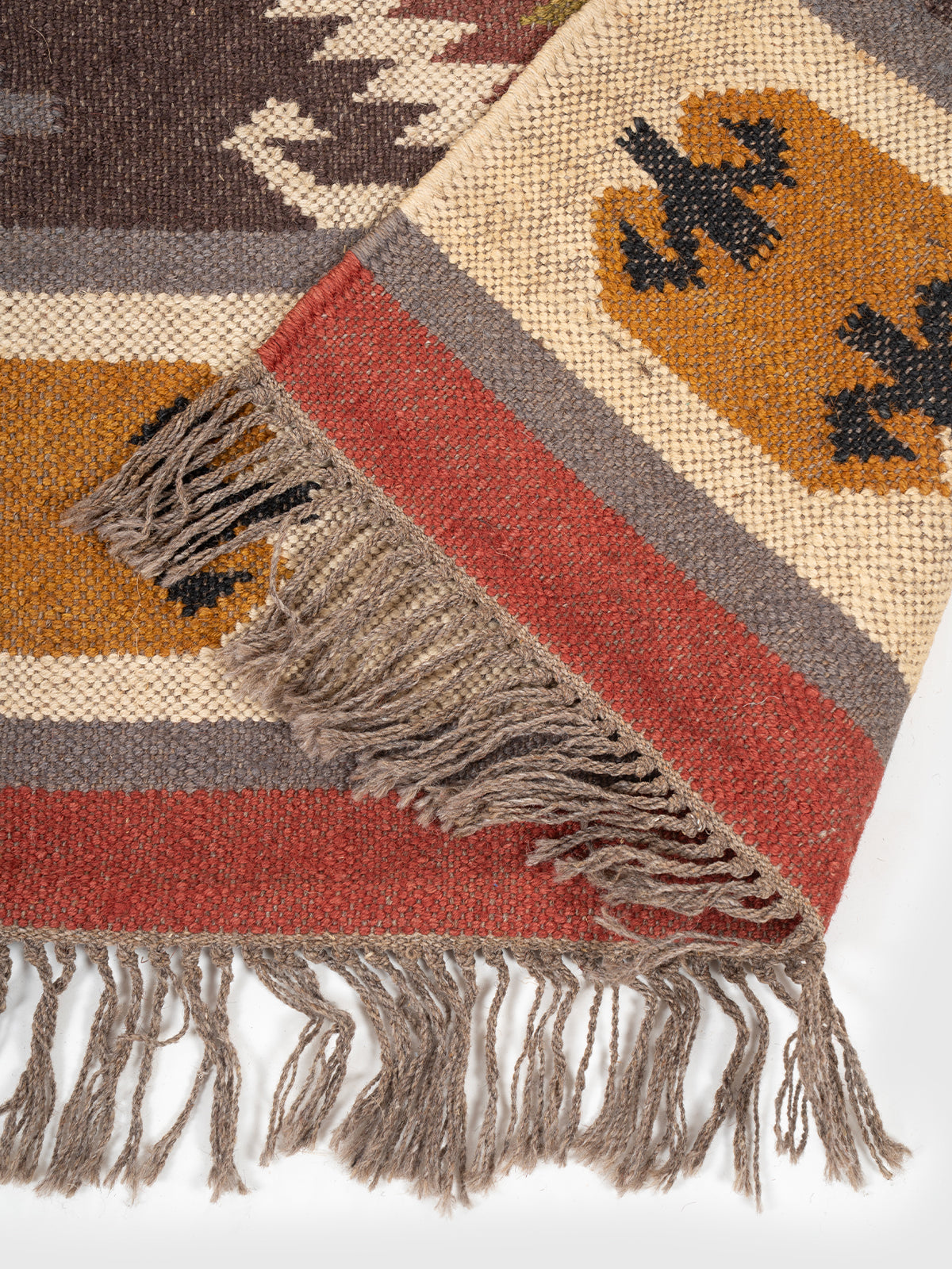 The Rustic Ridge Runner detail showing edge binding and wool finishing of the runner