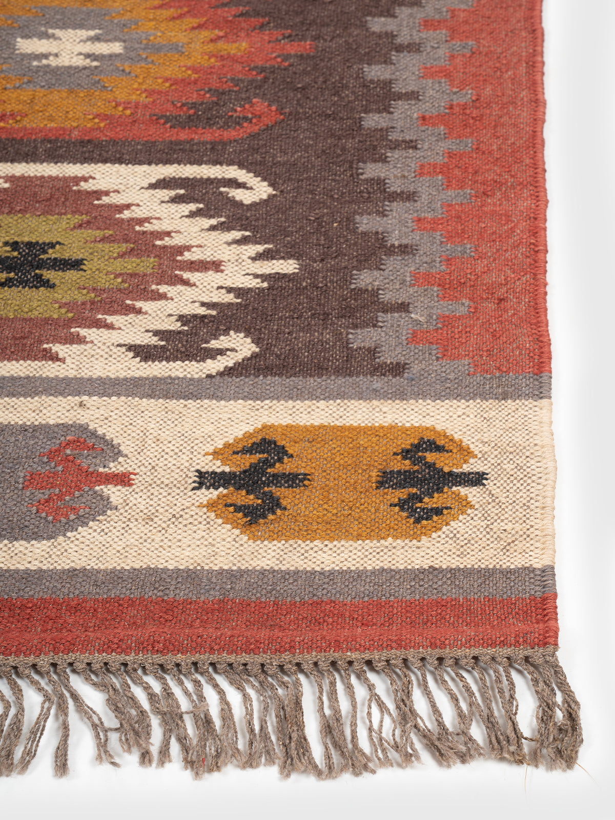 The Rustic Ridge Runner wool stair runner styled on a staircase in a designed interior