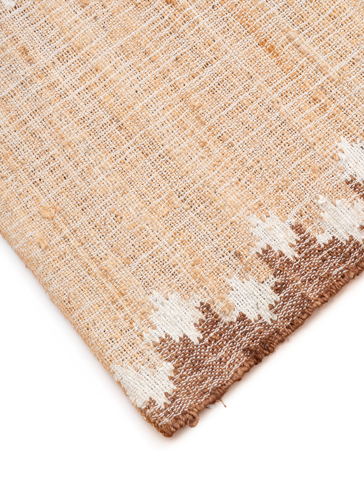 The Shoreline Runner detail showing edge binding and jute finishing of the runner
