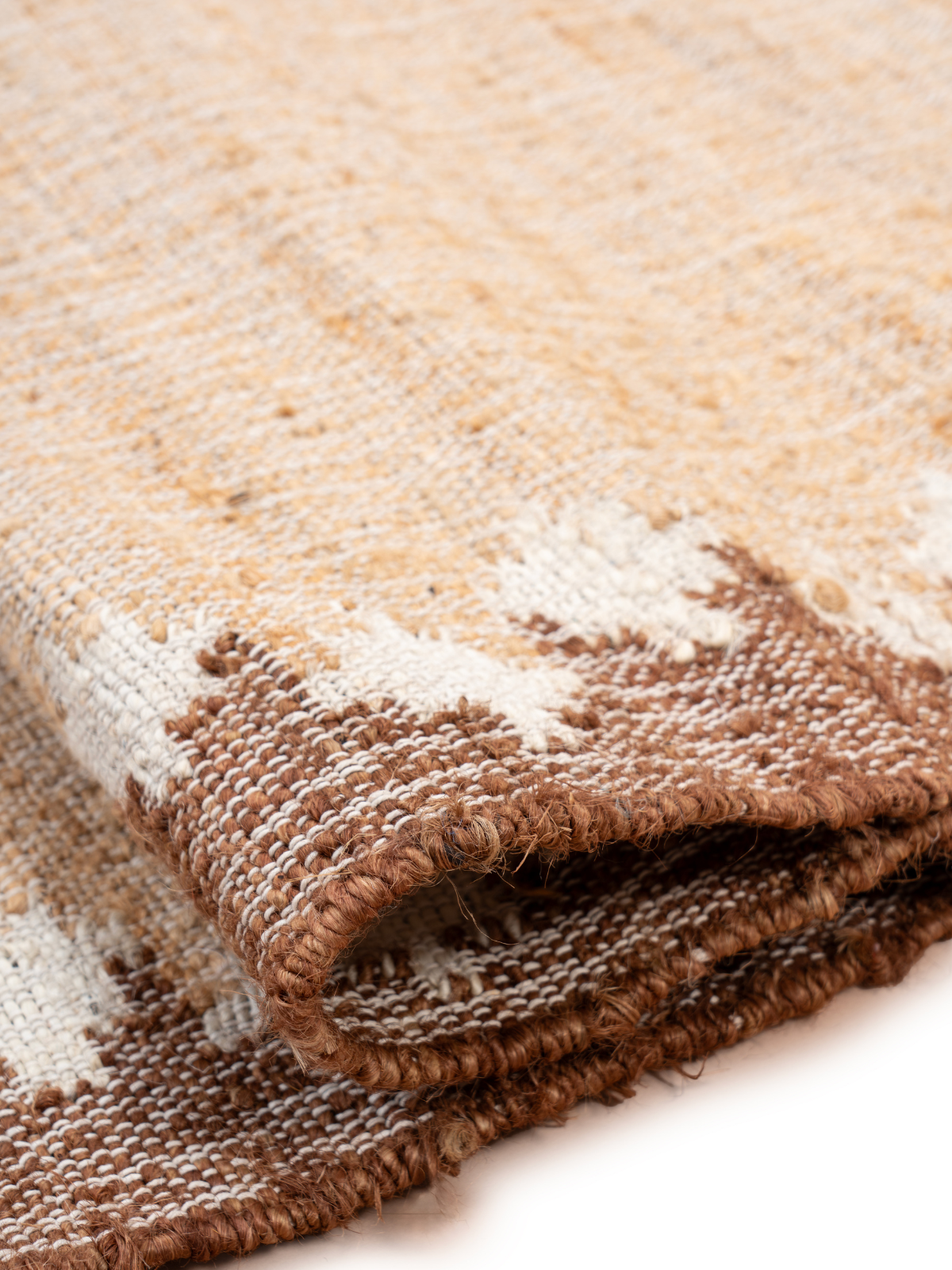 The Shoreline Runner jute stair runner styled on a staircase in a designed interior