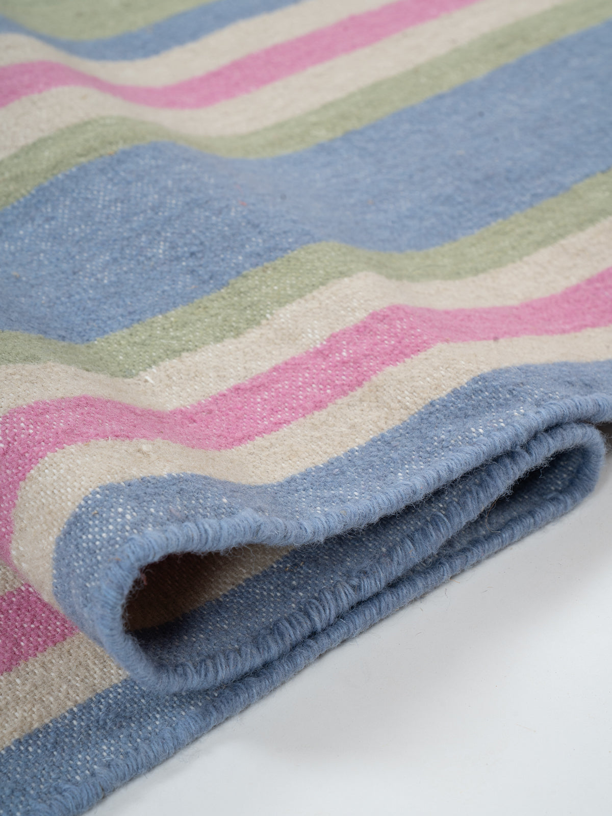 The Sky Blush Runner - cotton runner laid in a hallway view