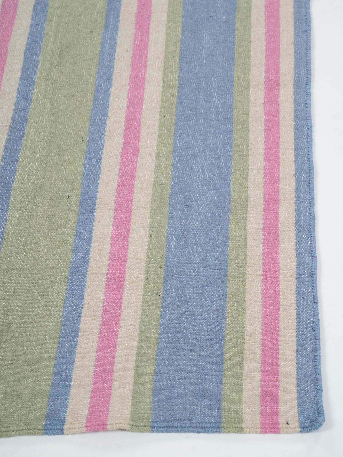 The Sky Blush Runner - cotton runner laid in a hallway view