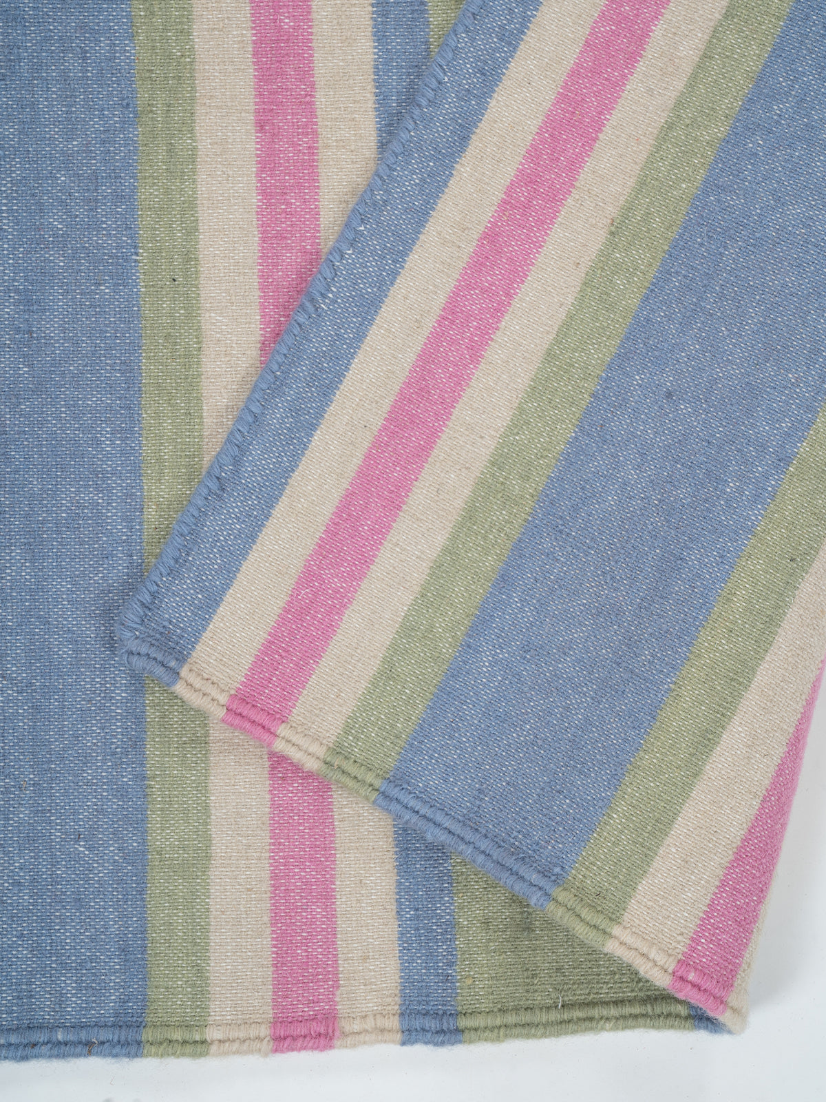 The Sky Blush Runner detail showing edge binding and cotton finishing of the runner