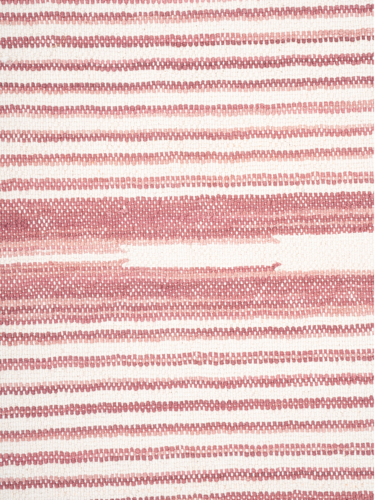 The Subtle Bloom Runner-Pink - cotton runner laid in a hallway view