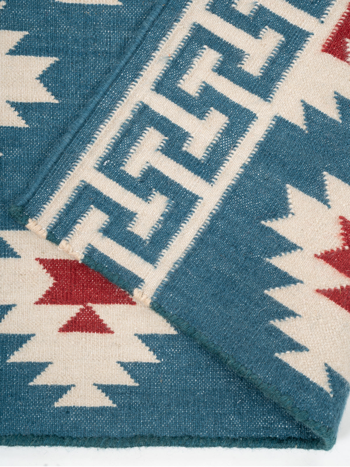 The Sultan's Path Runner-Blue detail showing edge binding and cotton finishing of the runner