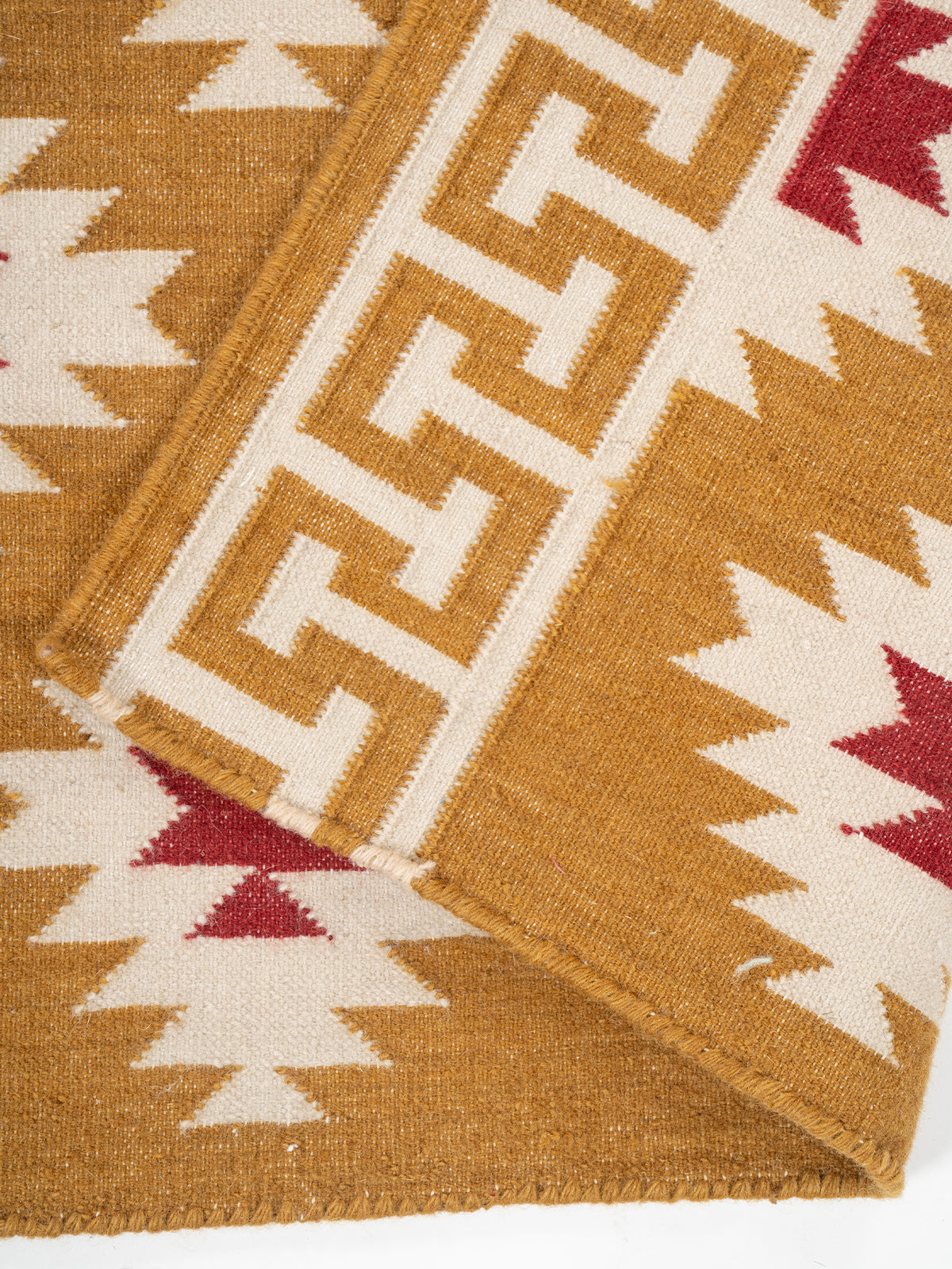 The Sultan's Path Runner detail showing edge binding and cotton finishing of the runner