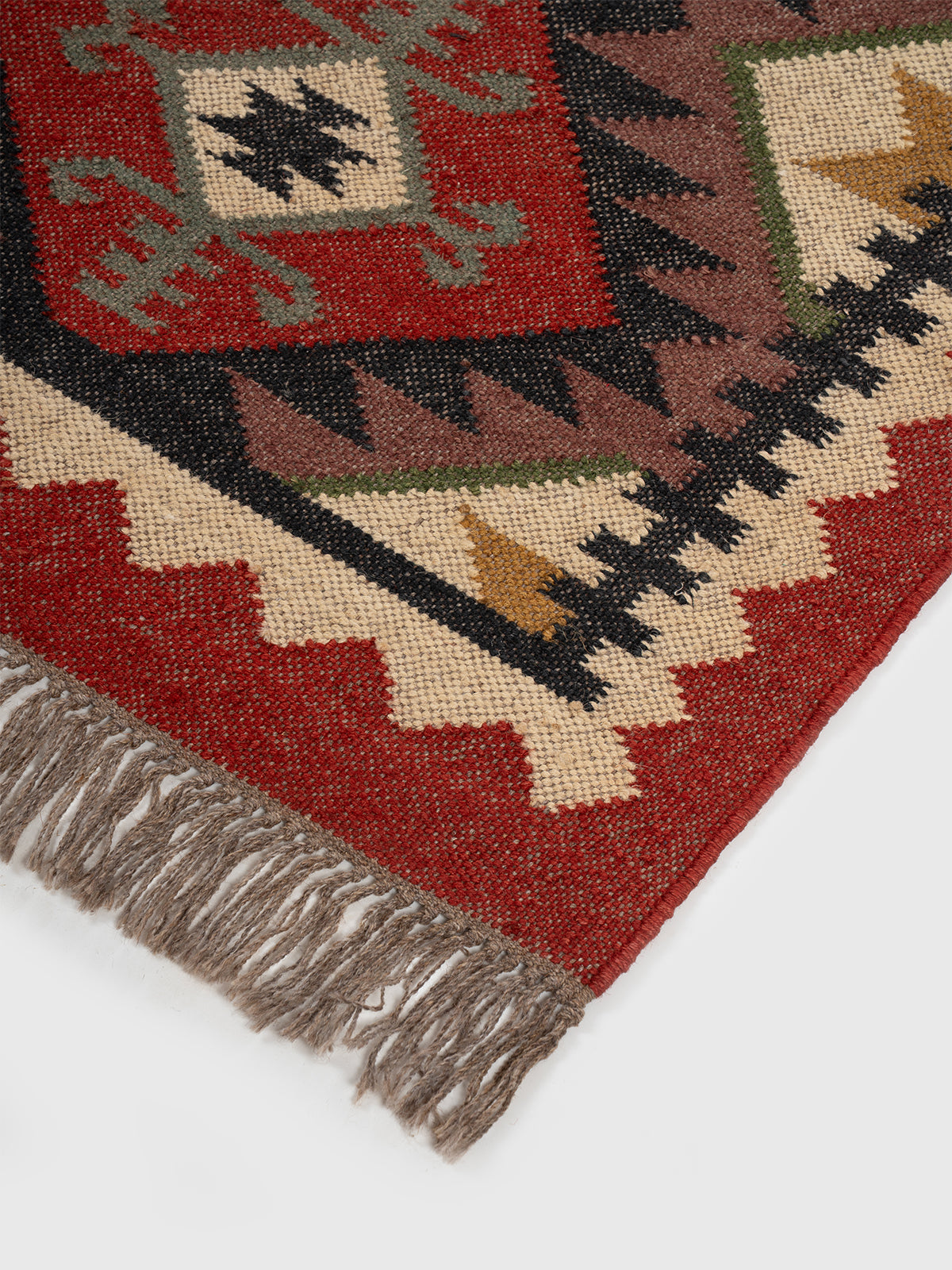 The Tribal Gem Runner close-up showing the wool weave and traditional surface