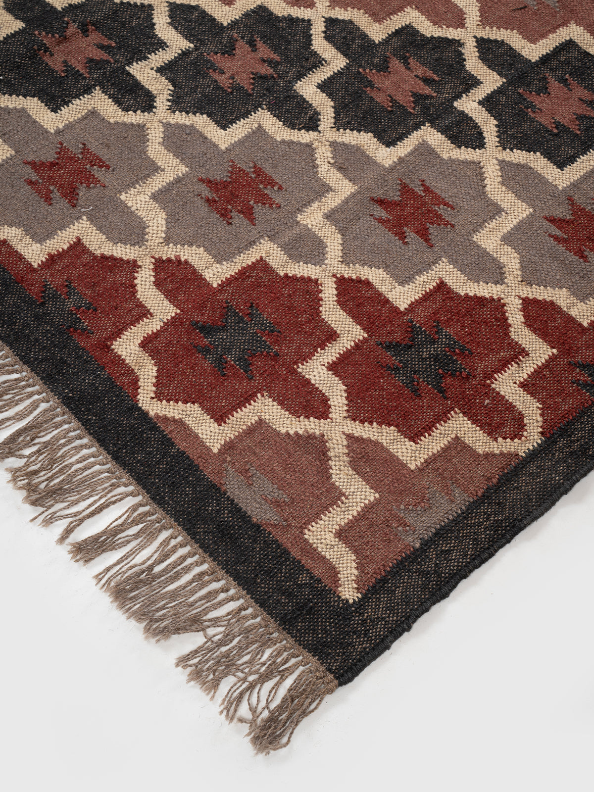 The Twilight Mosaic Rug close-up showing the wool weave and geometric motif