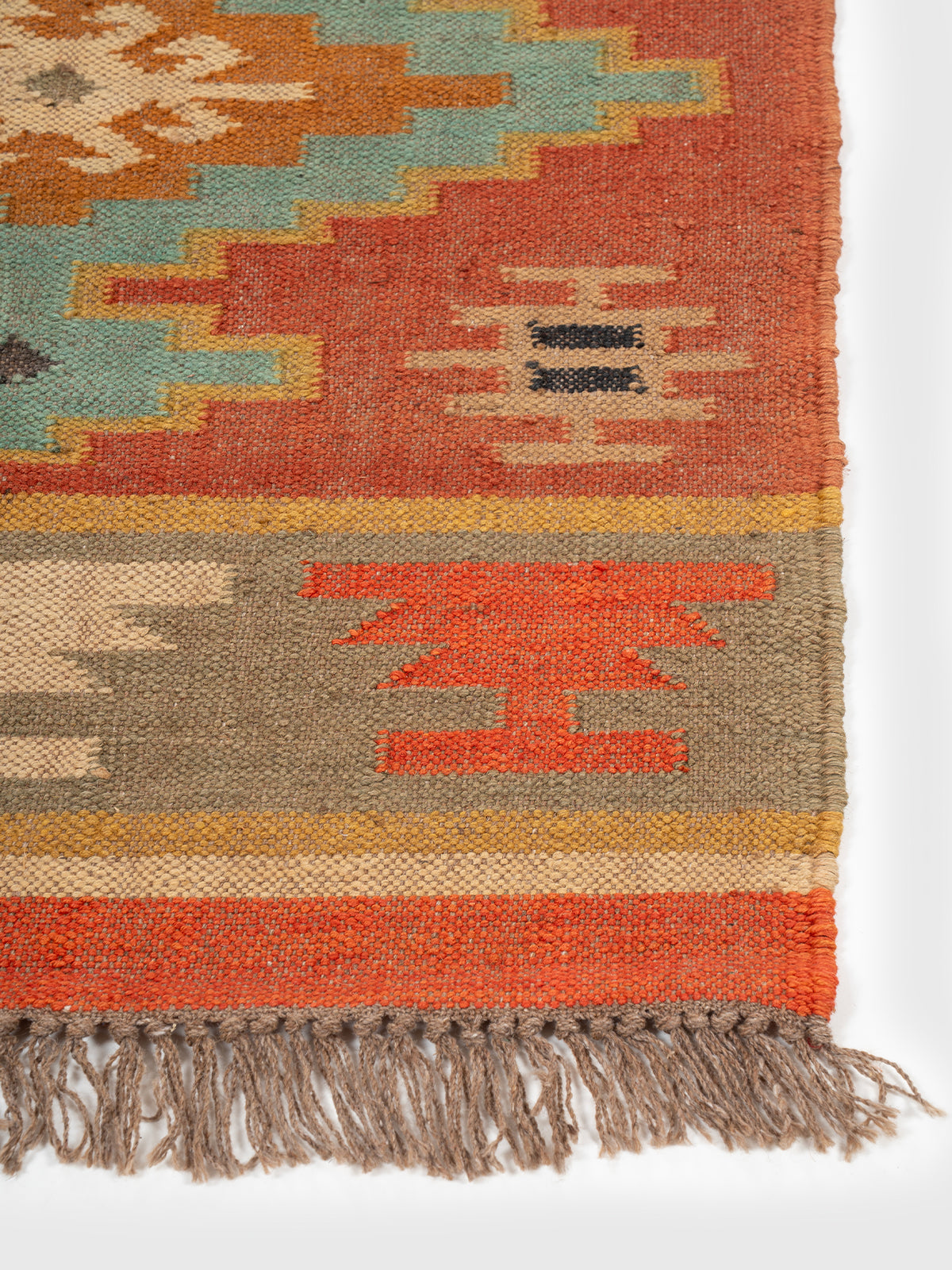 The Vibrant Strata Runner wool stair runner styled on a staircase in a designed interior