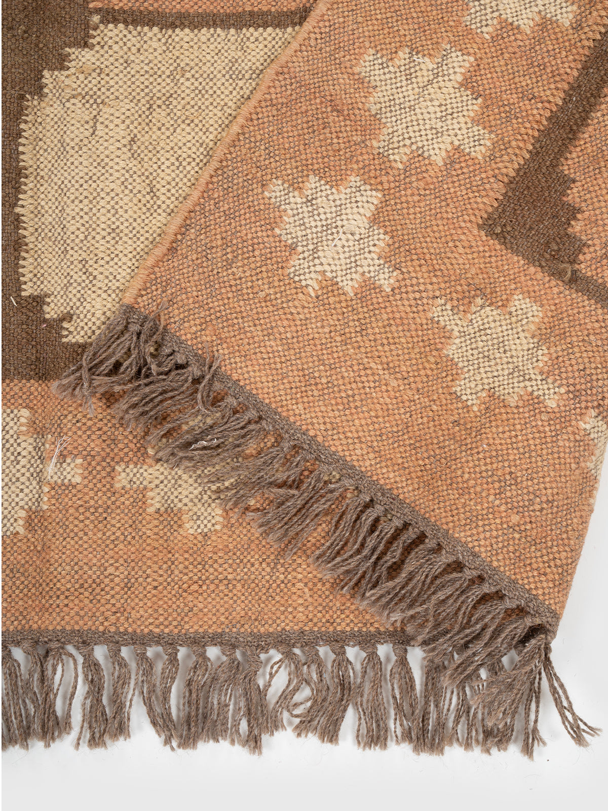 The Warm Lattice Rug detail of the geometric pattern in wool