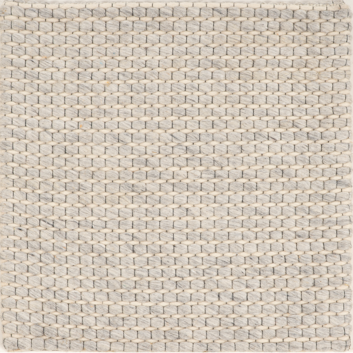 The Woven Mesh recycled pet rug in neutral tones