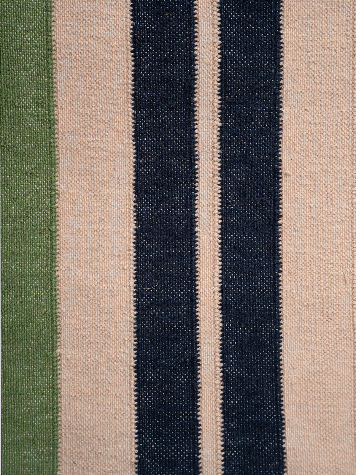 The Zigzag Trail Runner- Muted moss - cotton runner laid in a hallway view