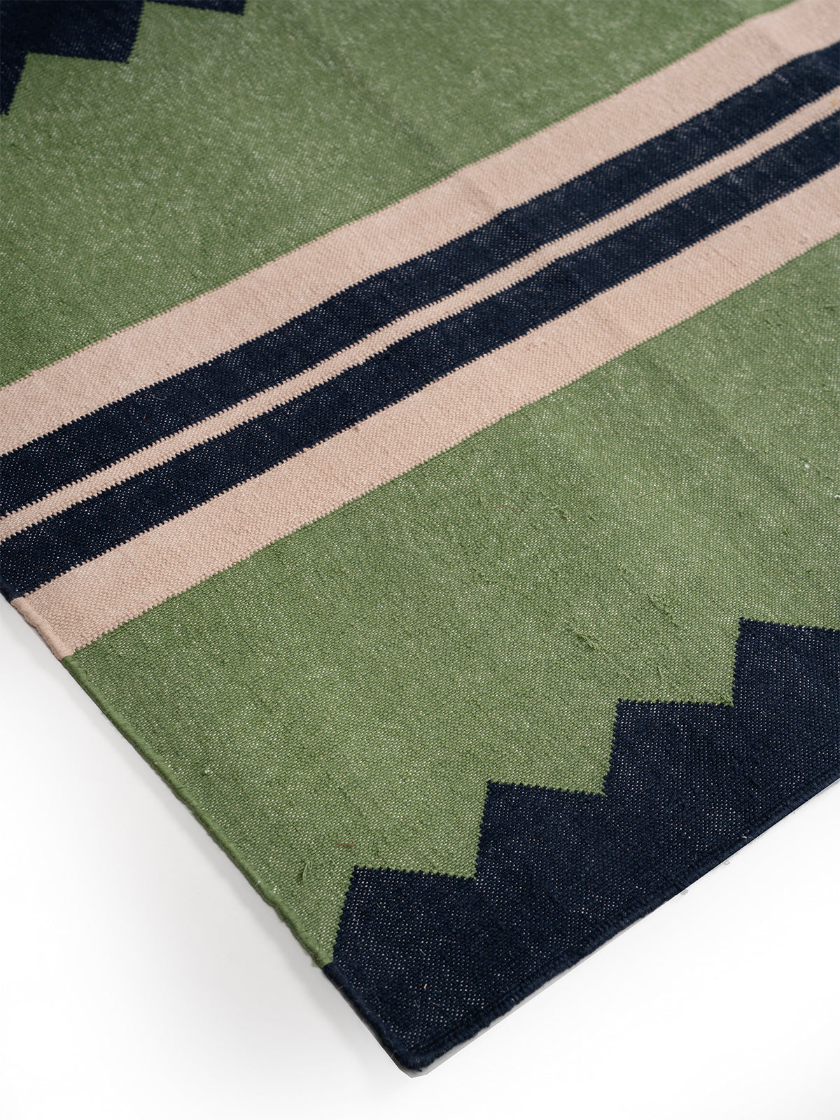 The Zigzag Trail Runner- Muted moss close-up showing the cotton weave and geometric surface
