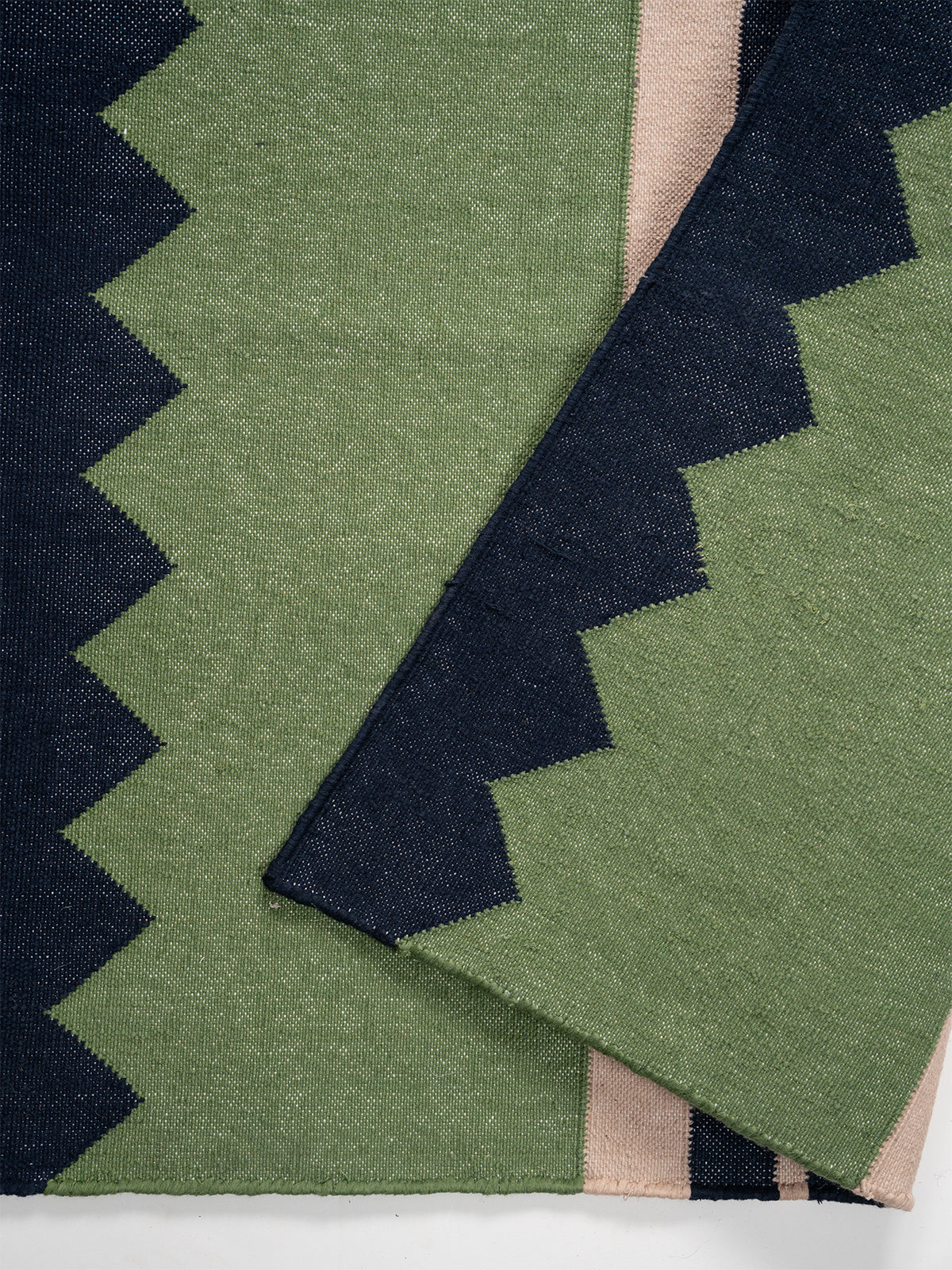 The Zigzag Trail Runner- Muted moss detail showing edge binding and cotton finishing of the runner