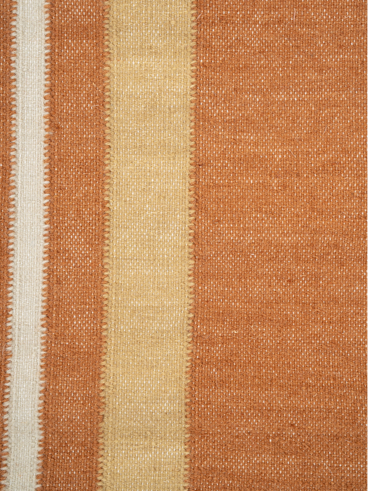 The Zigzag Trail Runner-Rust - cotton runner laid in a hallway view