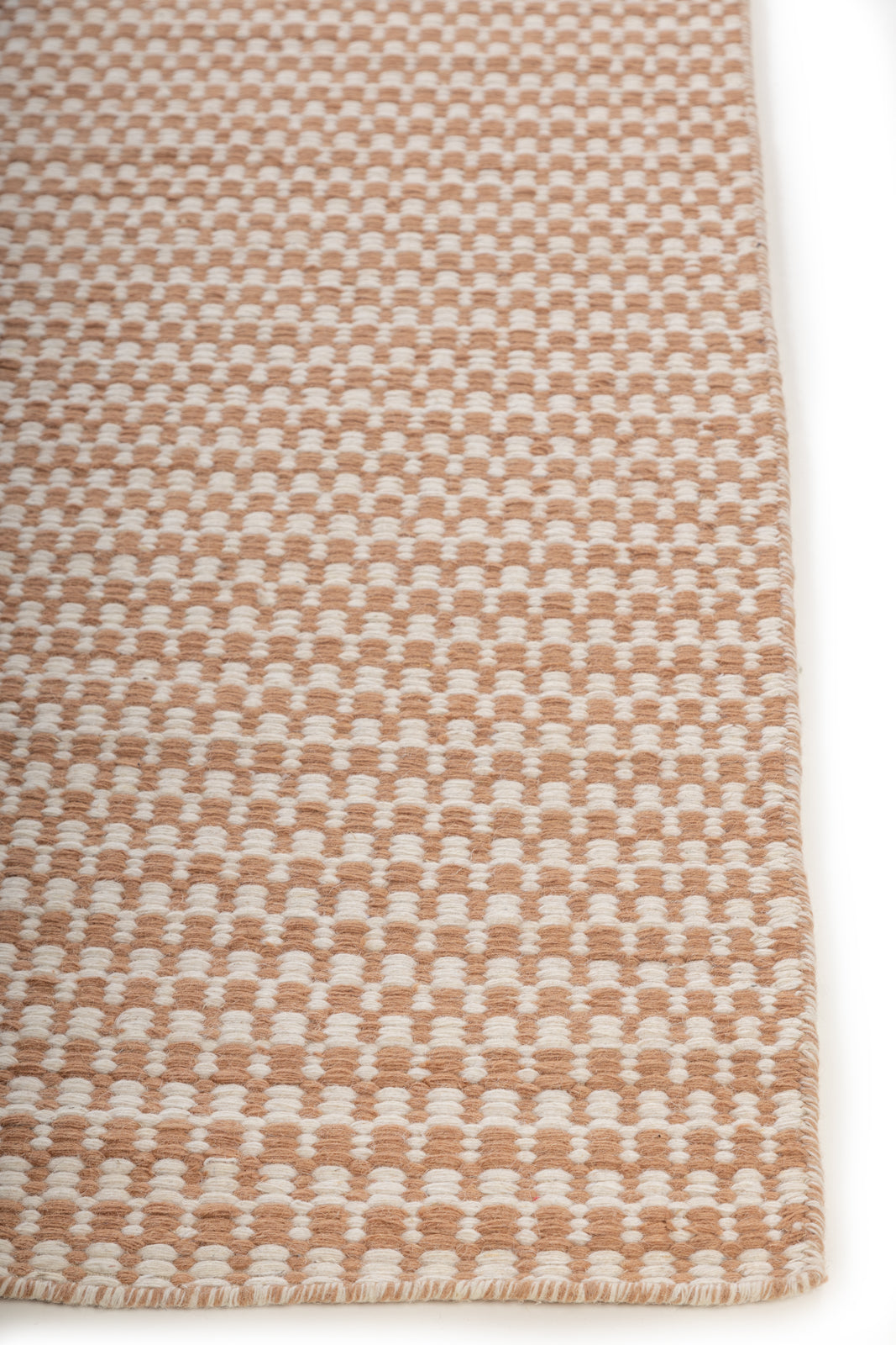 Thistledown Weave wool rug styled in a living room interior